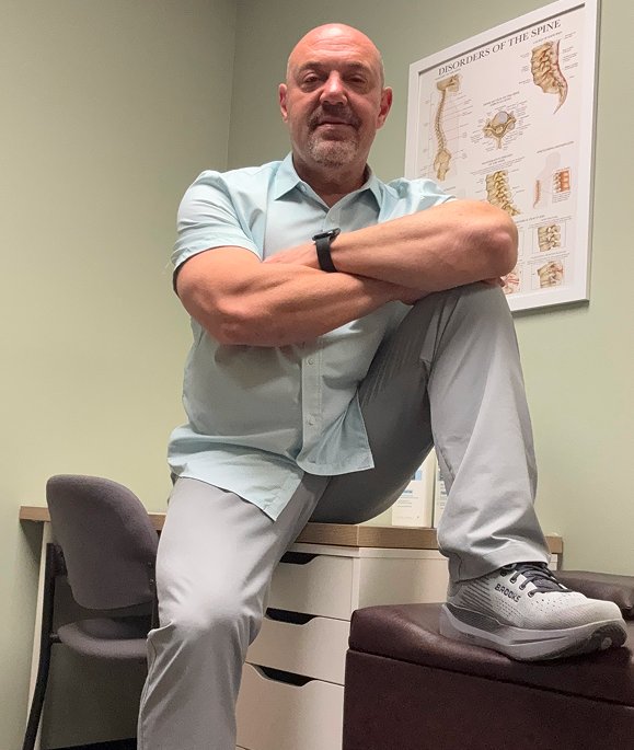 Dr. Gregory J. Garner, DC, DAAMLP, in his Poughkeepsie office